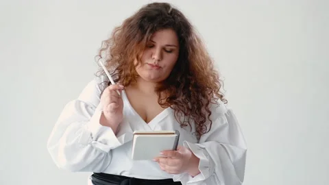 Task planning pensive curvy woman successful idea Stock Footage 158355502