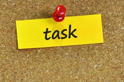 Task  word on notes paper with cork background Stock Photos