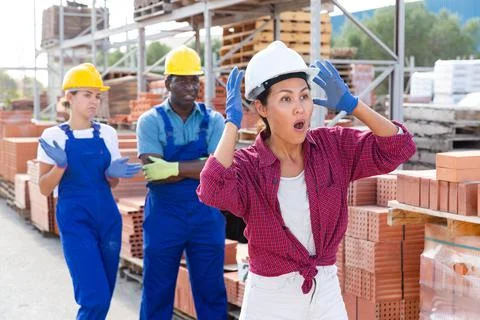 Taskmaster amazed by something in outdoor warehouse Stock Photos