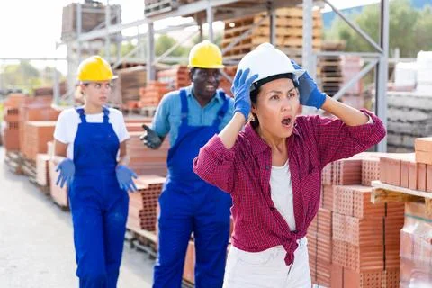 Taskmaster amazed by something in outdoor warehouse Stock Photos