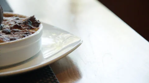 The Tastiest chocolate bread pudding on the table Stock Footage 35440840
