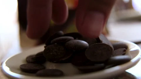 Tasting chocolate beautiful slow motion closeup Stock Footage 229718427