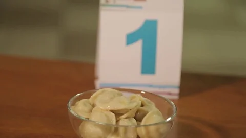 Tasting different producers of ravioli, close-up Stock Footage 75254365