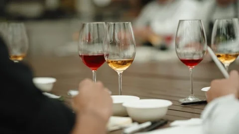 Tasting glasses on table during tea tasting event Stock Footage 345848623