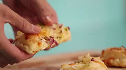 Tasting a mini onion pizza 스톡 동영상 133816213