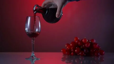 Tasting red wine and red fresh grape on the table. Holiday shot. advertising Stock Footage 162362477