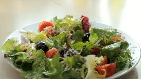 Tasting salad - slow motion 스톡 동영상 12718572