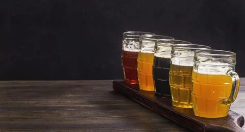 Tasting set of different types of beer with copy space Fotos de archivo