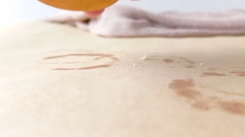 Tasting a sweet biscuit with a white background Stock Footage 146249799