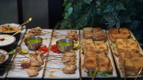 Tasty Appetizer Spread, Skewered Bites With Dipping Sauces, Baked Pastries Stock Footage 323776869