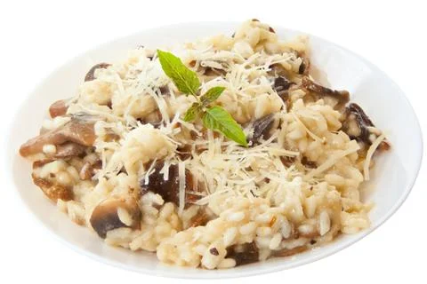 Tasty appetizing risotto on  white plate on  White background Stock Photos