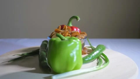 Tasty bread crackers, bell peppers and chilli pepper Stock Footage 124374858