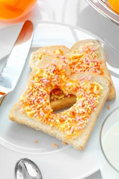 Tasty breakfast made of bread and candies Stock Photos