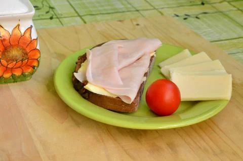 Tasty breakfast - slice of bread, ham and cheese Stock Photos