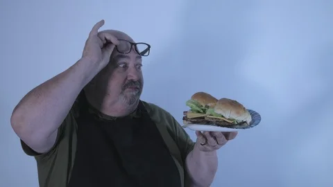 Tasty burger man Stock Footage 111881464
