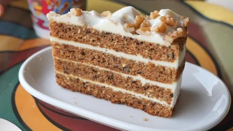 Tasty cake slice served on a plate at a local cafe Stock Footage 342213895