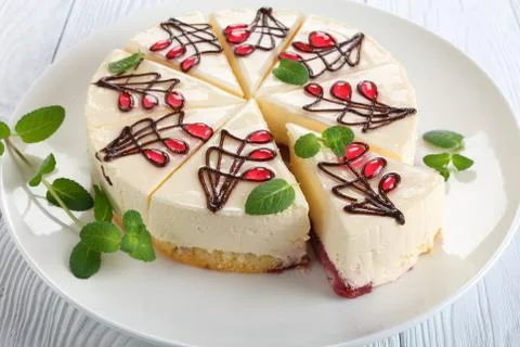 Tasty cheesecake with bottom layer of sponge cake Stock Photos