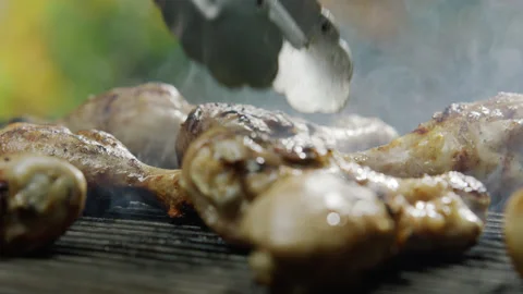Tasty Chicken Portion Grilling on Barbeque Grid Stock Footage 145249599