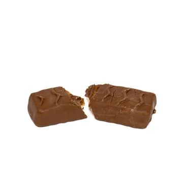 Tasty chocolate bar split in two pieces isolated on white background. Delicious Stock Photos