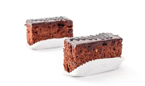 Tasty chocolate cake isolated on white background Photos