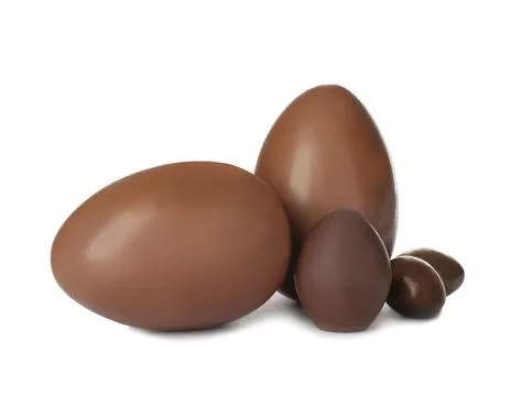 Tasty chocolate Easter eggs on white background Foto stock