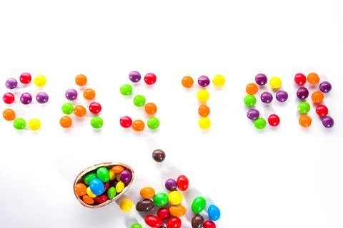 Tasty chocolate egg on white, Easter Stock Photos