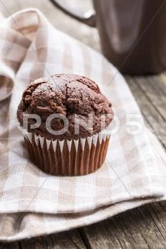 The tasty chocolate muffins. Stock Photos