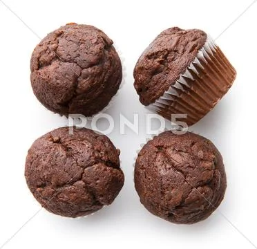 The tasty chocolate muffins. Stock Photos