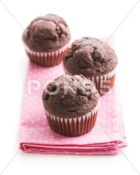 The tasty chocolate muffins. Stock Photos