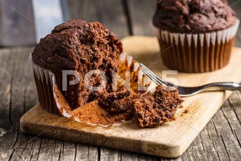 The tasty chocolate muffins. Stock Photos