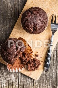 The tasty chocolate muffins. Stock Photos