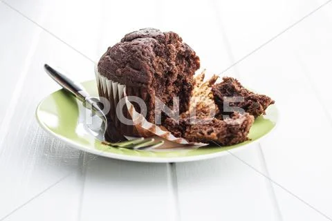 The tasty chocolate muffins. Stock Photos