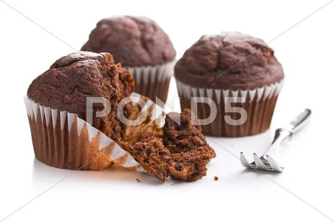 The tasty chocolate muffins. Stock Photos