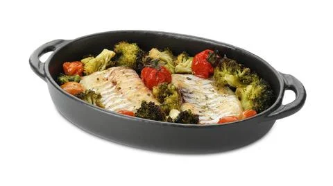 Tasty cod cooked with vegetables in baking tray isolated on white Stock Photos