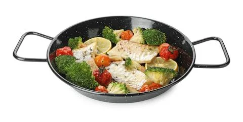 Tasty cod cooked with vegetables in frying pan isolated on white Stock Photos