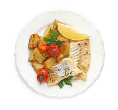 Tasty cod cooked with vegetables isolated on white, top view Stock Photos