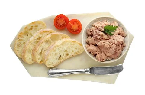Tasty cod liver, bread and tomato on white background, top view Stock Photos
