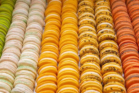 Tasty colourful rows of macaroons Stock Photos