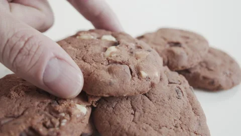 Tasty cookie taking from a stack 4K video Stock Footage 155360382