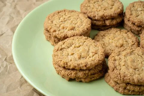  Tasty cookies biscuits. Stack of sugar cookies biscuits in green plate. T... Stock Photos