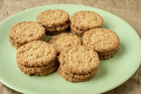  Tasty cookies biscuits. Stack of sugar cookies biscuits in green plate. T... Stock Photos