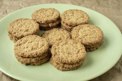 Tasty cookies biscuits. Stack of sugar cookies biscuits in green plate Stock Photos