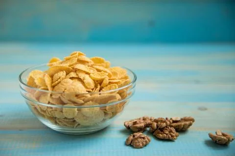 Tasty cornflakes with walnut Stock Photos