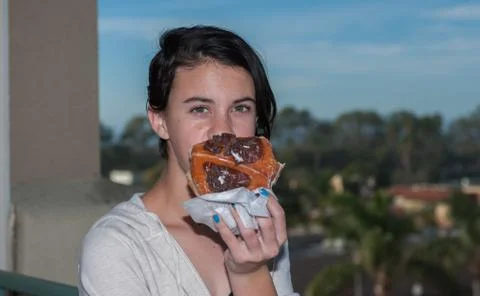 Tasty donut missing a few bites Foto stock