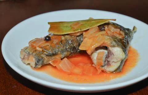 Tasty fish with sause Stock Photos