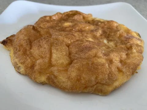 Tasty fried egg fried using the asian way Stock Photos