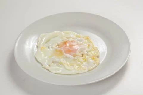 Tasty fried eggs Stock Photos