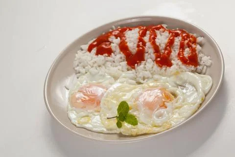 Tasty fried eggs Stock Photos