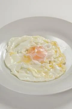 Tasty fried eggs Stock Photos