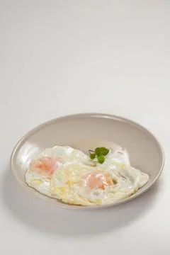 Tasty fried eggs Stock Photos